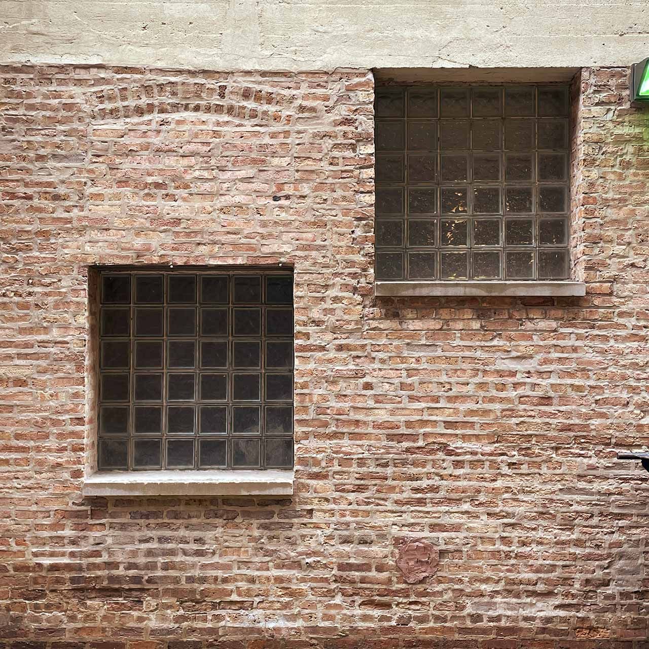 A glass block window in a previously bricked in window