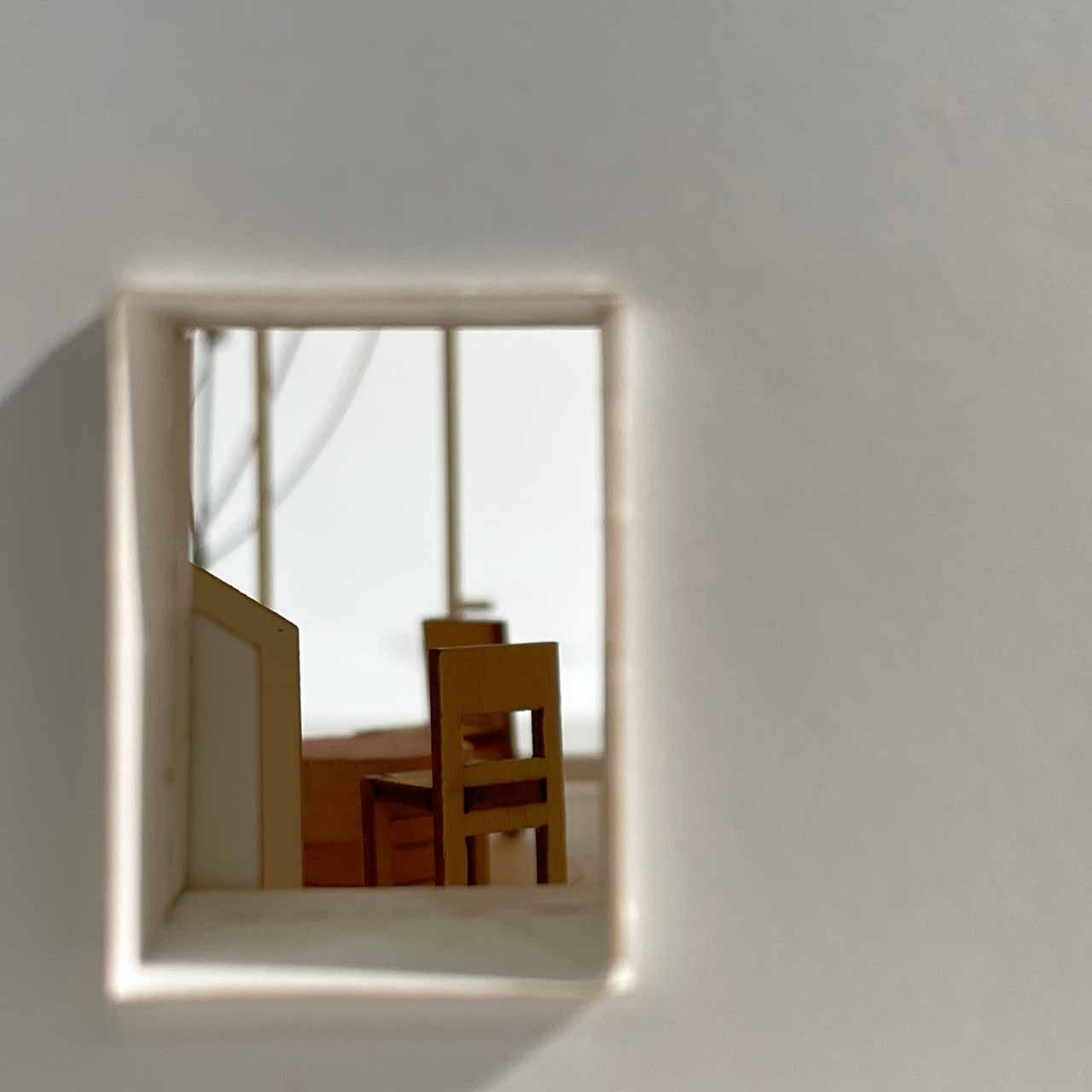 Close-up model photo of one of the windows in the facade